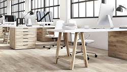 Bright modern office with light wood-look flooring